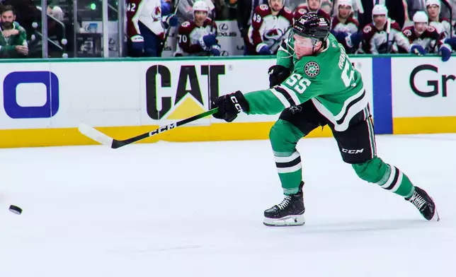 Dallas Stars defenseman Thomas Harley (55) scores during the first period of Game 5 of a first-round NHL hockey playoff series against the Colorado Avalanche in Dallas, Monday, April 28, 2025. (AP Photo/Gareth Patterson)