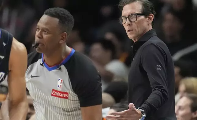 during the first half of an NBA basketball game, Sunday, April 13, 2025, in Atlanta. (AP Photo/Mike Stewart)