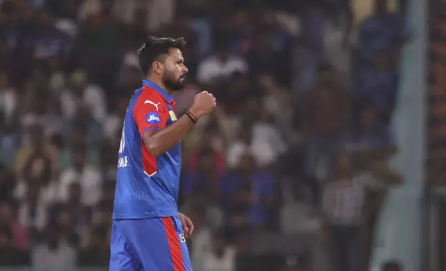 Delhi Capitals' Mukesh Kumar celebrates the wicket of Lucknow Super Giants' captain Rishabh Pant during the Indian Premier League cricket match between Lucknow Super Giants and Delhi Capitals at Atal Bihari Vajpayee Ekana Cricket Stadium in Lucknow, India, Tuesday, April 22, 2025. (AP Photo)
