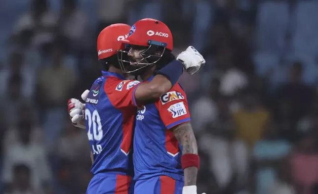 Delhi Capitals' captain Axar Patel, left, and KL Rahul celebrates after winning the Indian Premier League cricket match against Lucknow Super Giants at Atal Bihari Vajpayee Ekana Cricket Stadium in Lucknow, India, Tuesday, April 22, 2025. (AP Photo)