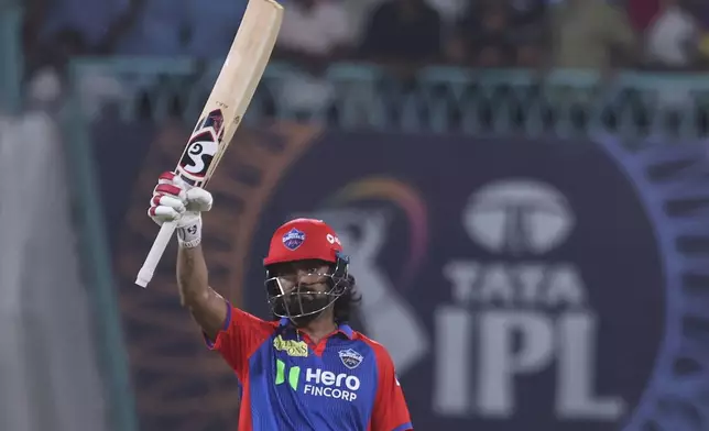 Delhi Capitals' KL Rahul celebrates after scoring fifty runs during the Indian Premier League cricket match between Lucknow Super Giants and Delhi Capitals at Atal Bihari Vajpayee Ekana Cricket Stadium in Lucknow, India, Tuesday, April 22, 2025. (AP Photo)