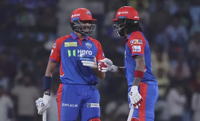 Delhi Capitals' captain Axar Patel, left, and KL Rahul encourages each other as they bat during the Indian Premier League cricket match between Lucknow Super Giants and Delhi Capitals at Atal Bihari Vajpayee Ekana Cricket Stadium in Lucknow, India, Tuesday, April 22, 2025. (AP Photo)