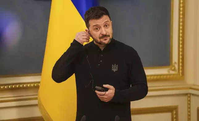 Ukrainian President Volodymyr Zelenskyy speaks during a press conference in Kyiv, Ukraine, Friday, April 4, 2025. (AP Photo/Evgeniy Maloletka)