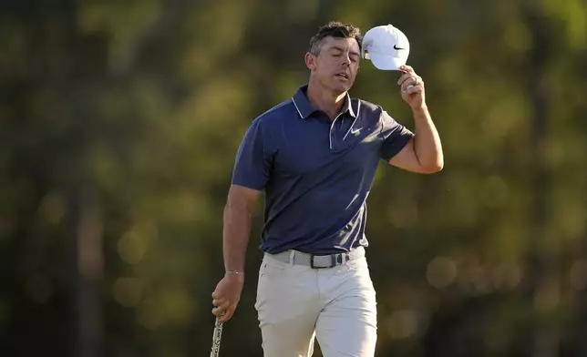 Rory McIlroy, of Northern Ireland, reacts after a bogey on the 18th hole during the final round at the Masters golf tournament, Sunday, April 13, 2025, in Augusta, Ga. (AP Photo/David J. Phillip)