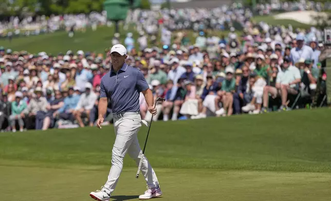 Rory McIlroy, of Northern Ireland, reacts after missing a putt on the second hole during the final round at the Masters golf tournament, Sunday, April 13, 2025, in Augusta, Ga. (AP Photo/David J. Phillip)