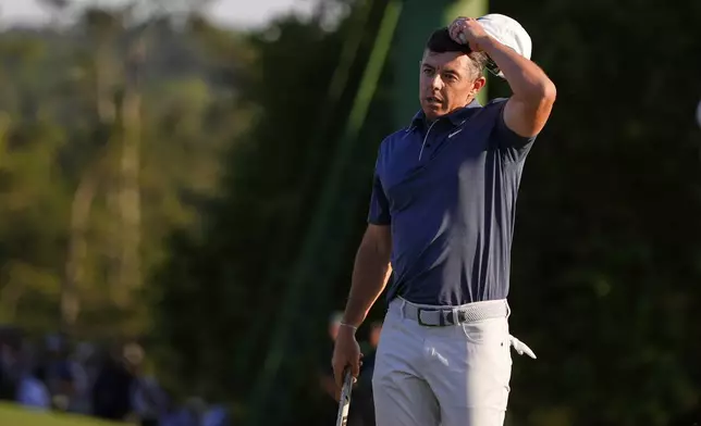 Rory McIlroy, of Northern Ireland, reacts after a bogey on the 18th hole during the final round at the Masters golf tournament, Sunday, April 13, 2025, in Augusta, Ga. (AP Photo/Julia Demaree Nikhinson)
