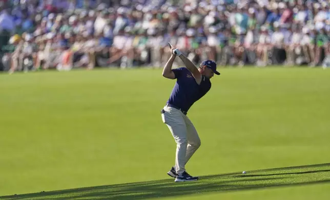 Bryson DeChambeau hits from the fairway on the 13th hole during the final round at the Masters golf tournament, Sunday, April 13, 2025, in Augusta, Ga. (AP Photo/George Walker IV)