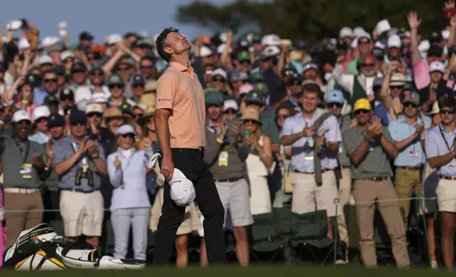 Justin Rose celebrates after a birdie on the 18th hole during the final round at the Masters golf tournament, Sunday, April 13, 2025, in Augusta, Ga. (AP Photo/Matt Slocum)