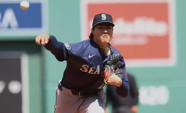 Seattle Mariners pitcher Bryan Woo throws during the first inning of a baseball game against the Boston Red Sox, Thursday, April 24, 2025, in Boston. (AP Photo/Mark Stockwell)