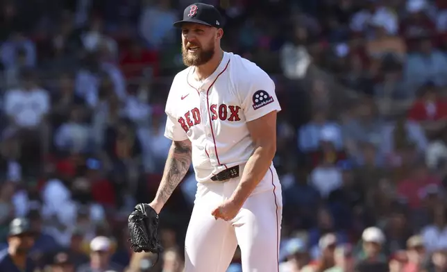Boston Red Sox pitcher Garrett Crochet reacts after striking out Seattle Mariners' Ben Williamson leaving two runners on base during the fifth inning of a baseball game, Thursday, April 24, 2025, in Boston. (AP Photo/Mark Stockwell)