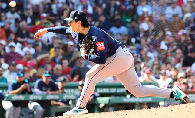 Seattle Mariners pitcher Bryan Woo delivers from the mound during the sixth inning of a baseball game against the Boston Red Sox, Thursday, April 24, 2025, in Boston. (AP Photo/Mark Stockwell)