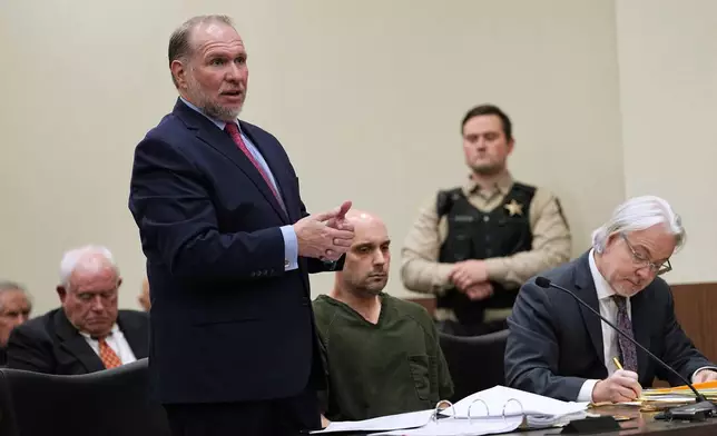 Attorneys for Sean M. Higgins, the driver charged with killing NHL hockey player Johnny Gaudreau and his brother Matthew while they were bicycling, speak at the Salem County, N.J., Courthouse, Tuesday, April 15, 2025, in Salem, N.J. (AP Photo/Matt Rourke)