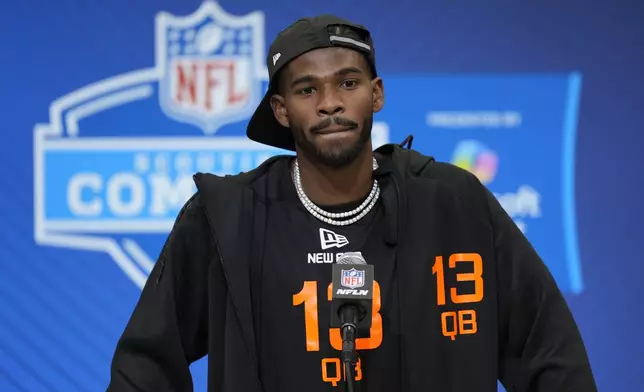 FILE - Colorado quarterback Shedeur Sanders speaks during a press conference at the NFL football scouting combine Friday, Feb. 28, 2025, in Indianapolis. (AP Photo/George Walker IV, File)