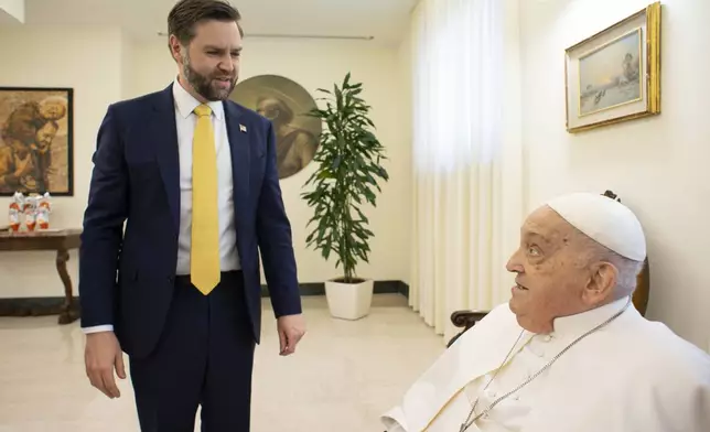Pope Francis receives U.S. Vice President JD Vance before bestowing the Urbi et Orbi (Latin for to the city and to the world) blessing at the end of the Easter mass presided over by Cardinal Angelo Comastri in St. Peter's Square at the Vatican Sunday, April 20, 2025. At center the head of the papal houshold Bishop Leonardo Sapienza. (Vatican Media via AP, HO)