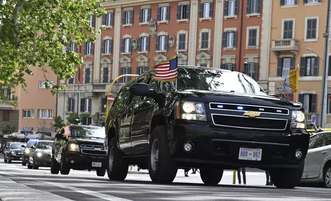 The motorcade of U.S. Vice President JD Vance is seen en route to Vatican, in Rome, Italy, Sunday, April 20, 2025. (Kenny Holston/Pool Photo via AP)
