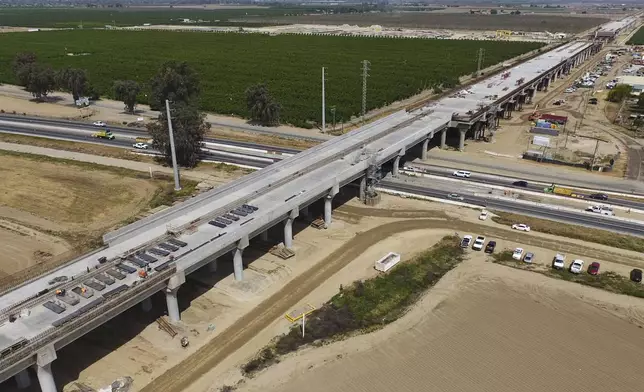 The Hanford Viaduct construction site is shown in an aerial view, Tuesday, April 15, 2025, in Kings County, Calif. (AP Photo/Godofredo A. Vásquez)