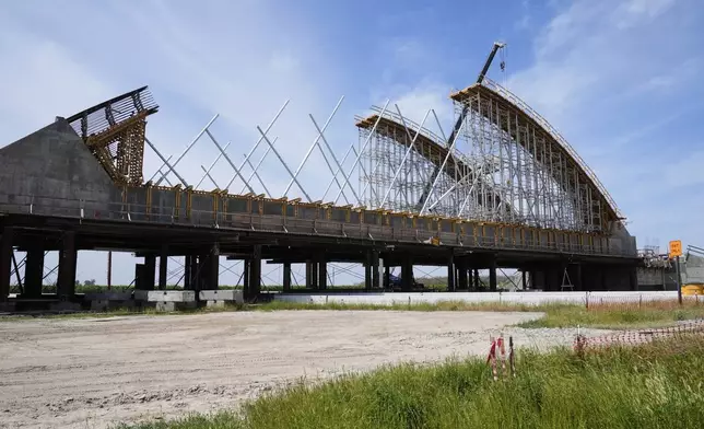 The Tied Arch Bridge construction site, which will take high-speed trains over State Route 43, Tuesday, April 15, 2025, is shown in Fresno County, Calif. (AP Photo/Godofredo A. Vásquez)
