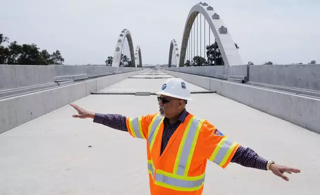 Garth Fernandez, Central Valley regional director for the California High-Speed Rail Authority, talks about the Cedar Viaduct, Tuesday, April 15, 2025, in Fresno, Calif. (AP Photo/Godofredo A. Vásquez)