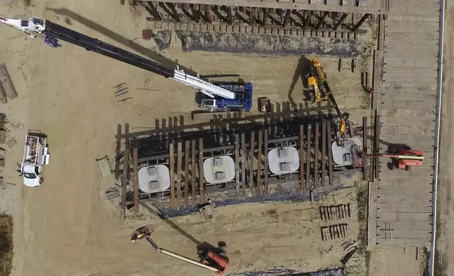 The Hanford Viaduct construction site is shown in an aerial view, Tuesday, April 15, 2025, in Kings County, Calif. (AP Photo/Godofredo A. Vásquez)