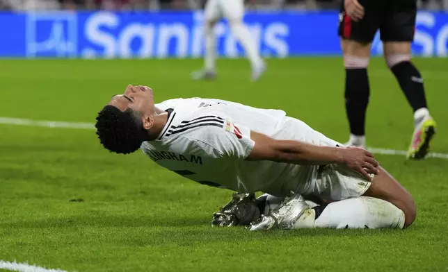 Real Madrid's Jude Bellingham reacts during the Spanish La Liga soccer match between Real Madrid and Athletic Bilbao at the Santiago Bernabeu stadium in Madrid, Sunday, April 20, 2025. (AP Photo/Manu Fernandez)