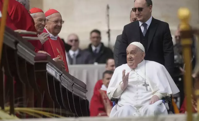 Pope Francis arrives at the end of the mass on Palm Sunday in St. Peter's Square at The Vatican, Sunday, April 13, 2025. (AP Photo/Gregorio Borgia)