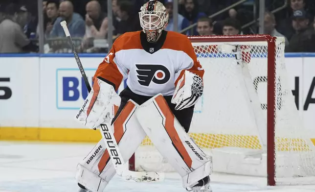Philadelphia Flyers goaltender Aleksei Kolosov (35) protects the net during the first period of an NHL hockey game against the New York Rangers Wednesday, April 9, 2025, in New York. (AP Photo/Frank Franklin II)