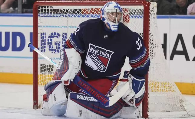 New York Rangers goaltender Jonathan Quick (32) protects the net during the second period of an NHL hockey game against the Philadelphia Flyers Wednesday, April 9, 2025, in New York. (AP Photo/Frank Franklin II)