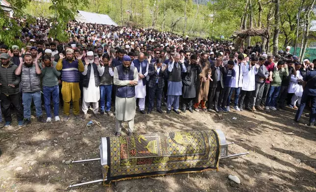 Chief Minister of Jammu &amp; Kashmir, Omar Abdullah, prays with the congregation at the funeral of Adil Hussain Shah, a daily-wage worker, who died when militants indiscriminately opened fire on a crowd of mainly tourists on Tuesday, at his village Hapatnar, about 20 km (13 miles) from Pahalgam where the incident took place, Indian controlled Kashmir, Wednesday, April 23, 2025. (AP Photo/Dar Yasin)