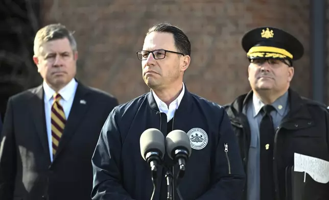 Pennsylvania Gov. Josh Shapiro pauses during a news conference at the governor's official residence discussing the alleged arson that forced him, his family and guests to flee in the middle of the night on the Jewish holiday of Passover, Sunday, Apr. 13, 2025, in Harrisburg, Pa. (AP Photo/Marc Levy)