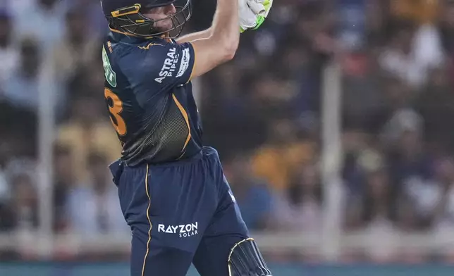 Gujarat Titans' Jos Butler plays a shot during the Indian Premier League cricket match between Gujarat Titans and Delhi Capitals at Narendra Modi Stadium in Ahmedabad, India, Saturday, April 19, 2025. (AP Photo/Ajit Solanki)