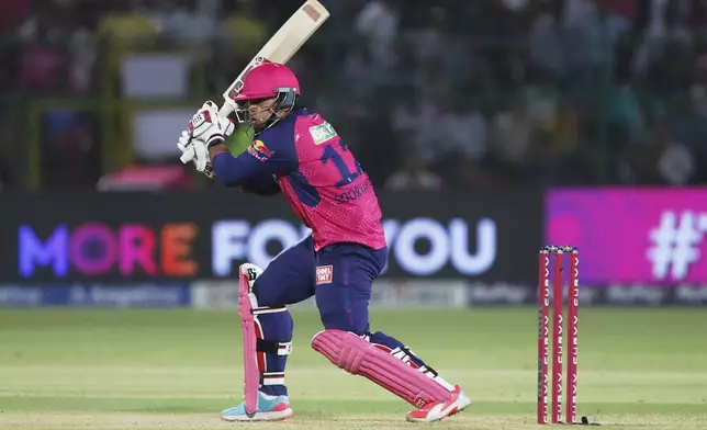 Rajasthan Royals' Vaibhav Suryavanshi plays a shot during the Indian Premier League cricket match between Lucknow Super Giants and Rajasthan Royals at Sawai Mansingh Stadium in Jaipur, India, Saturday, April 19, 2025. (AP Photo/Surjeet Yadav)