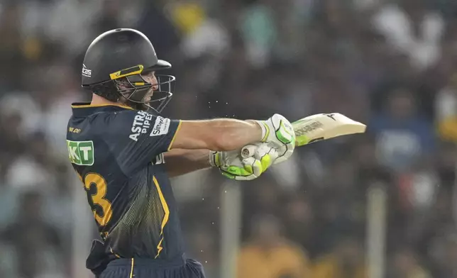 Gujarat Titans' Jos Butler plays a shot during the Indian Premier League cricket match between Gujarat Titans and Delhi Capitals at Narendra Modi Stadium in Ahmedabad, India, Saturday, April 19, 2025. (AP Photo/Ajit Solanki)