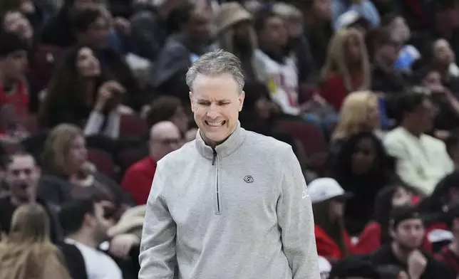 Washington Wizards head coach Brian Keefe reacts during the second half of an NBA basketball game against the Chicago Bulls in Chicago, Friday, April 11, 2025. (AP Photo/Nam Y. Huh)