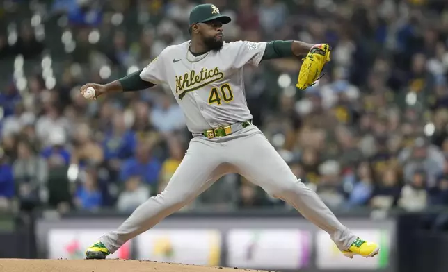 Athletics' Luis Severino pitches during the first inning of a baseball game against the Milwaukee Brewers, Saturday, April 19, 2025, in Milwaukee. (AP Photo/Aaron Gash)