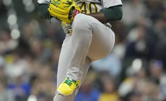 Athletics' Luis Severino pitches during the first inning of a baseball game against the Milwaukee Brewers, Saturday, April 19, 2025, in Milwaukee. (AP Photo/Aaron Gash)
