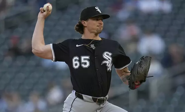 Chicago White Sox starting pitcher Davis Martin (65) delivers during the first inning of a baseball game against the Minnesota Twins, Tuesday, April 22, 2025, in Minneapolis. (AP Photo/Abbie Parr)