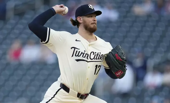 Minnesota Twins starting pitcher Bailey Ober (17) delivers during the first inning of a baseball game against the Chicago White Sox, Tuesday, April 22, 2025, in Minneapolis. (AP Photo/Abbie Parr)