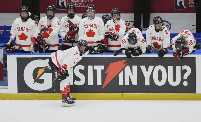 Canada players stand dejected after the gold medal match between Canada and United States at the Women's Ice Hockey Championships in Ceske Budejovice, Czech Republic, Sunday, April 20, 2025. (AP Photo/Petr David Josek)