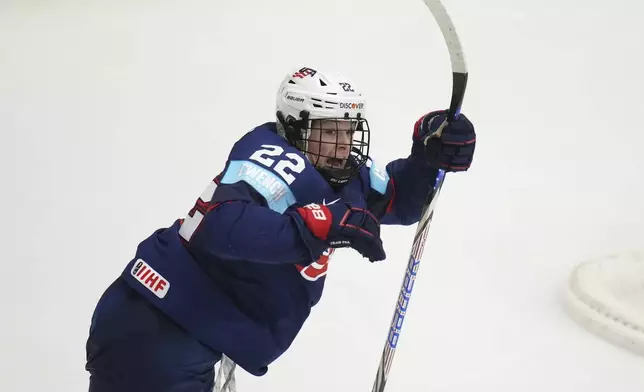 United States' Tessa Janecke celebrates after scoring a sudden death goal in overtime during the gold medal match between Canada and United States at the Women's Ice Hockey Championships in Ceske Budejovice, Czech Republic, Sunday, April 20, 2025. (AP Photo/Petr David Josek)