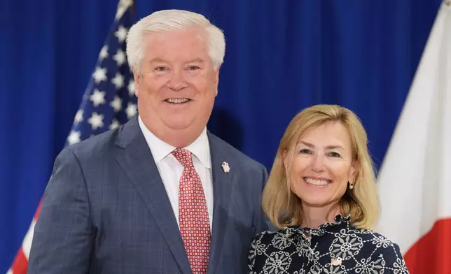 New U.S. Ambassador to Japan George Glass and his wife Mary pose for the media at a press conference after their arrival in Tokyo Friday, April 18, 2025. (Kazuhiro Nogi/Pool Photo via AP)