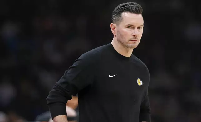 Los Angeles Lakers coach JJ Redick looks on during the first half of an NBA basketball game against the Oklahoma City Thunder, Sunday, April 6, 2025, in Oklahoma City. (AP Photo/Nate Billings)