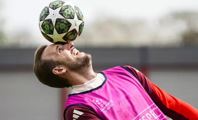 Munich's Harry Kane in action during a training session in Munich, Germany, Tuesday, April 15, 2025, ahead of the Champions League soccer match between Inter Milan and FC Bayern Munich. (Tom Weller/dpa via AP)