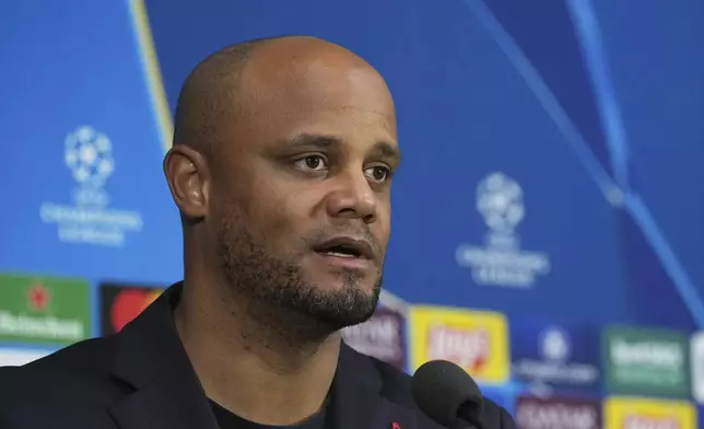 Bayern's head coach Vincent Kompany attends a press conference at the San Siro stadium in Milan, Italy, Tuesday, April 15, 2025, ahead of the Champions League quarterfinals second leg soccer match between Inter Milan and Bayern Munich on Wednesday. (AP Photo/Antonio Calanni)
