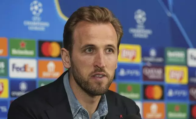 Bayern's Harry Kane attends a press conference at the San Siro stadium in Milan, Italy, Tuesday, April 15, 2025, ahead of the Champions League quarterfinals second leg soccer match between Inter Milan and Bayern Munich on Wednesday. (AP Photo/Antonio Calanni)