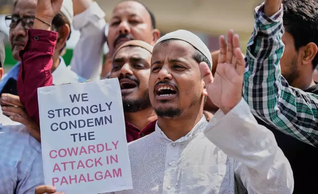 Muslims shout slogans after Friday prayers during a protest against the killing of tourists by militants near Pahalgam in Indian controlled Kashmir, in Guwahati, India, Friday, April 25, 2025. (AP Photo/Anupam Nath)