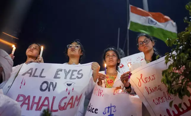 People attend a protest and solidarity march after tourists were killed near Pahalgam in Indian controlled Kashmir, northern Indian state of Uttar Pradesh, Saturday, April 26,2025. (AP Photo/Rajesh Kumar Singh)