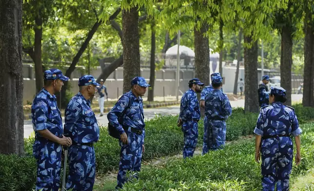 Security personnel guard outside Pakistan High Commission a day after militants indiscriminately opened fire on tourists near Pahalgam in Indian controlled Kashmir, in New Delhi, India, Wednesday, April 23, 2025. (AP Photo/Manish Swarup)