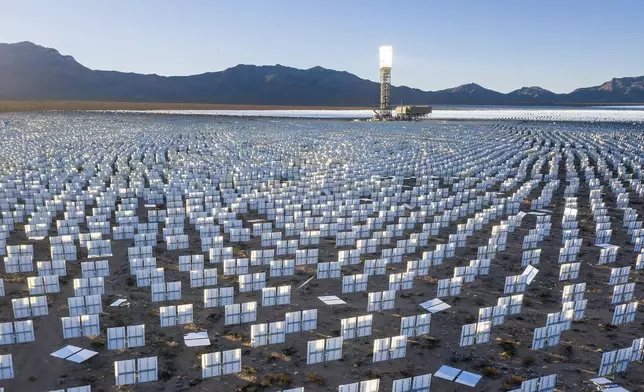FILE -Solar panels line the Ivanpah Solar Electric Generating System in San Bernardino County, Calif., on Monday, Nov. 29, 2021. (AP Photo/Noah Berger,File)