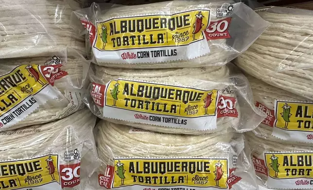 Stacks of tortillas sit on a grocery store shelf in Albuquerque, New Mexico, on Thursday, April 10, 2025. (AP Photo/Susan Montoya Bryan)