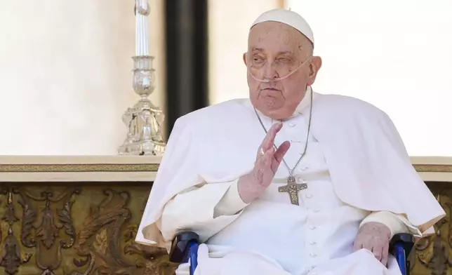 Pope Francis arrives in a wheelchair at the end of a mass in St. Peter's Square at The Vatican, Sunday, April 6, 2025, part of the Jubilee of the sick and the health workers. (AP Photo/Andrew Medichini)